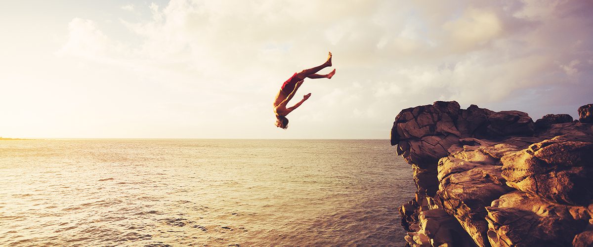Cliff Jumping into the Ocean at Sunset, Summer Fun Lifestyle