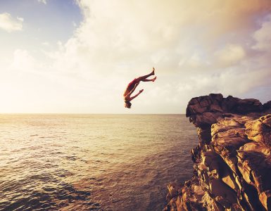 Cliff Jumping into the Ocean at Sunset, Summer Fun Lifestyle