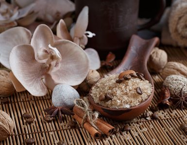 SPA concept: natural sea salt with coffee beans, cinnamon and anise star