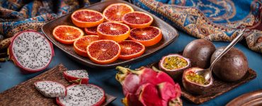 Healthy exotic fruit concept on black slate